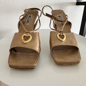 Authentic Moschino Metallic Gold Strappy Heeled Sandals with Heart Accent